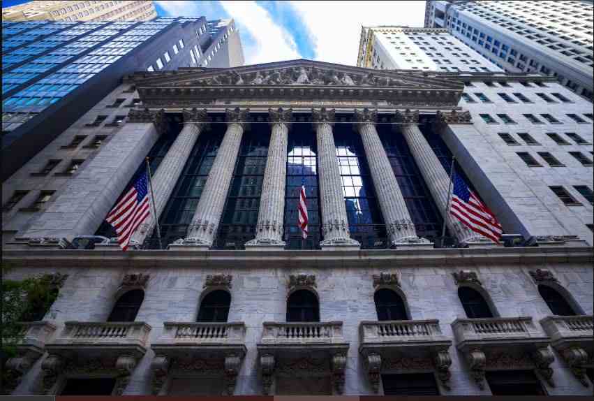 New York Stock Exchange building on Wall Street as the Dow Jones falls 653 points amid surging oil prices and rising Treasury yields.